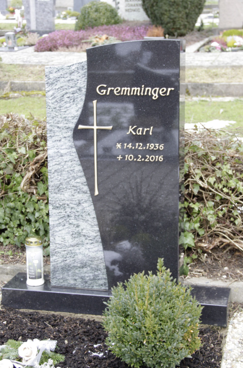 Einzelgrabstein von Bernhard Stein- und Metallkunst mit verschiedenen Steinen und Metall Inschriften